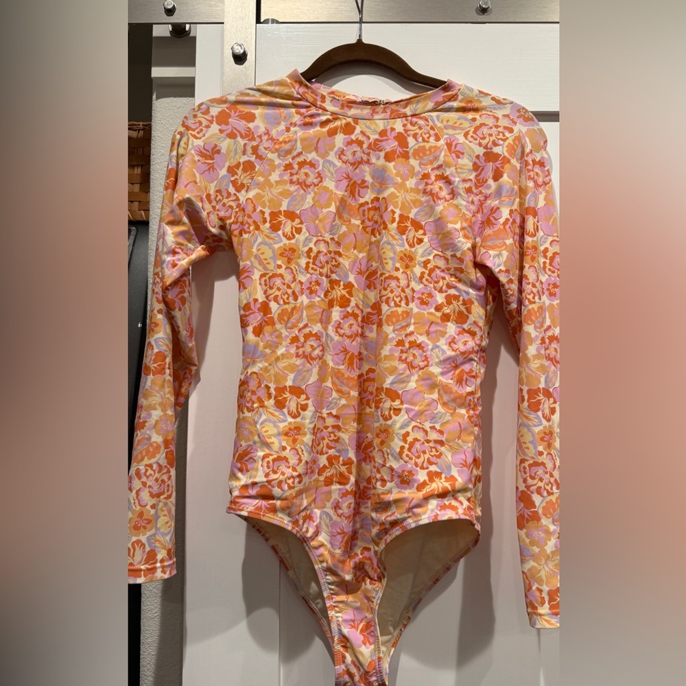 Rusty one piece long sleeve bathing suit size M